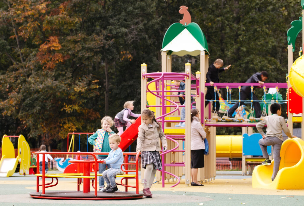 An outdoor playground where children are free to exercise agency in early childhood by choosing what equipment to play on.